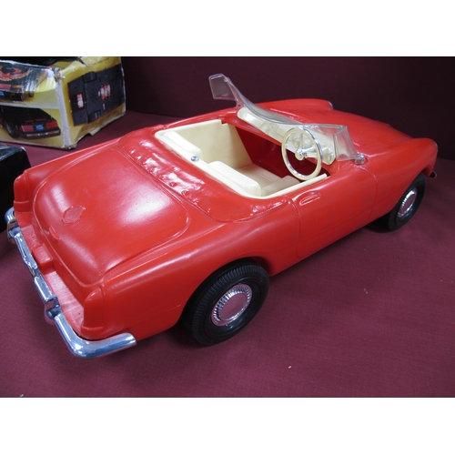 502 - An original Sindy MG motor car boxed, plus a selection of Sindy and associated clothes, all loose.