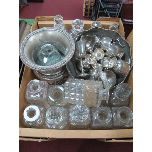 1046 - A large collection of glass decanters some with stoppers together with a silver plate punch bowl set... 