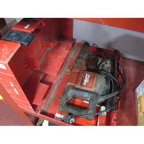 1063 - A HILTI TE705 Breaker in original box with instructiuons and attachments. Untested sold only for par... 