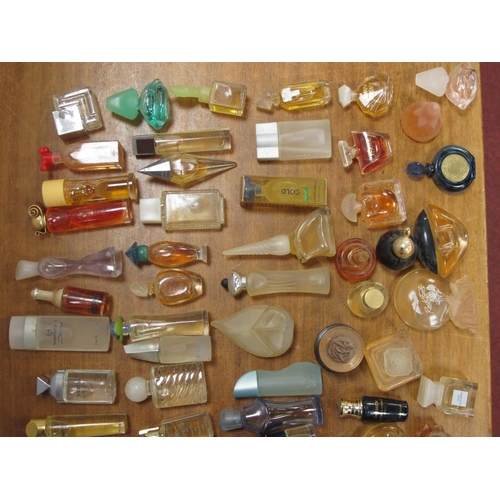 1268 - Perfume Miniatures - Coco Channel, Eu De Rochas, Ivorie de Balmain, etc, together with boxes.