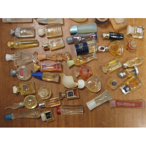 1268 - Perfume Miniatures - Coco Channel, Eu De Rochas, Ivorie de Balmain, etc, together with boxes.