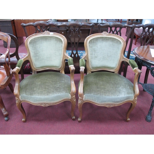 1504 - Pair of French Style Armchairs, with carved top rails, upholstered back panel, arms, seats, carved s... 