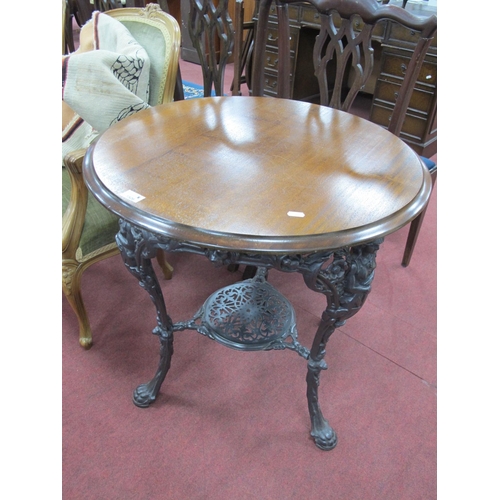 1506 - XIX Century Cast Iron Britannia Pub Table, with pierced undershelf, and later circular top, 68cm dia... 