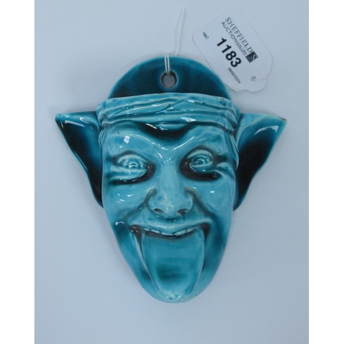 1183 - Turquoise Pottery Wall Posy, similar to Burmantofts, circa 1900, as a male head sticking his tongue ... 