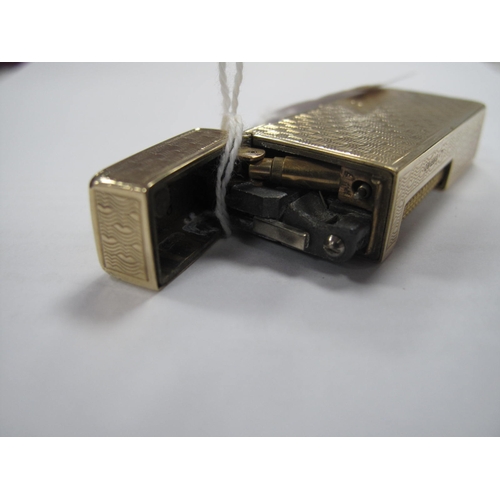 142 - Dunhill; A 9ct Gold Cigarette Lighter, allover engine turned decoration, London 1966, 6.5cm.