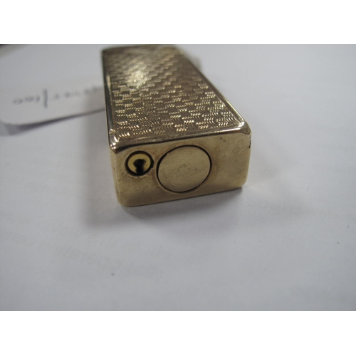 142 - Dunhill; A 9ct Gold Cigarette Lighter, allover engine turned decoration, London 1966, 6.5cm.