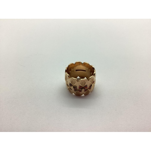 227 - A 9ct Gold Wide Patterned Band, with wavy edge (approx finger size P) (12.5grams).