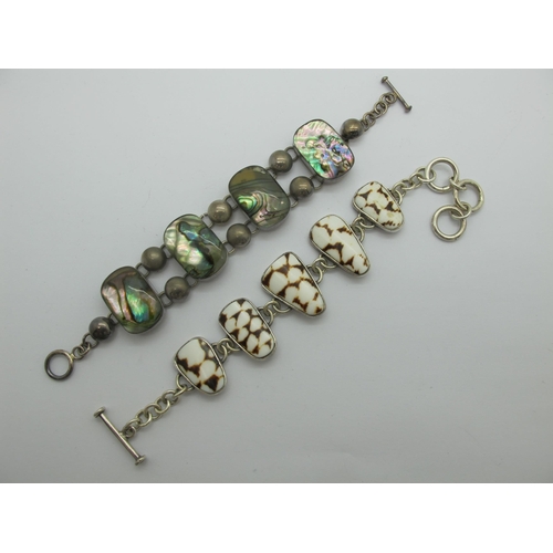 144 - A Modern Shell Inset Chunky Bracelet, collet set, to T-bar and loop fastener; together with another ... 