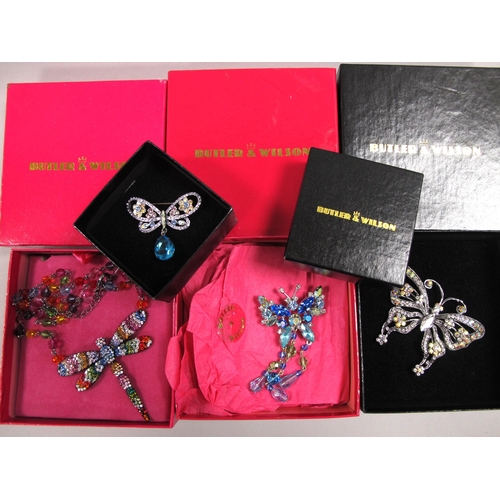 17 - Butler & Wilson; Moder Butterfly Brooches, boxed; Together with A Butler & Wilson Dragonfly Crystal ... 