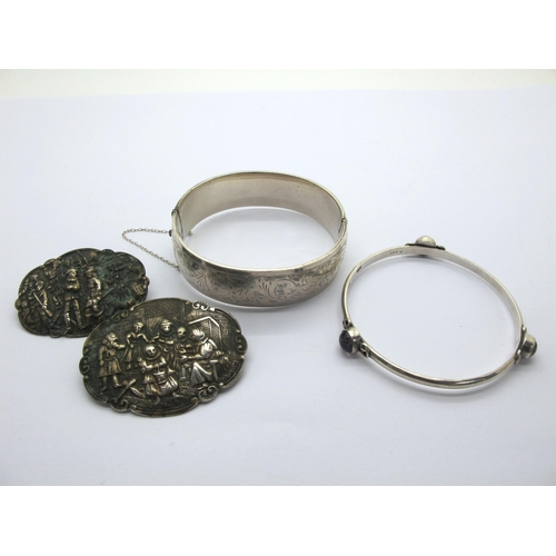 187 - A Hallmarked Silver hinged Bangle, leaf scroll engraved to the front, hinged to snap clasp; together... 