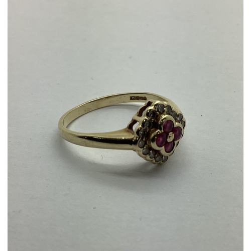 214 - A Modern 9ct Gold Cluster Ring, shaped collet set (finger size Q) (2.6grams).