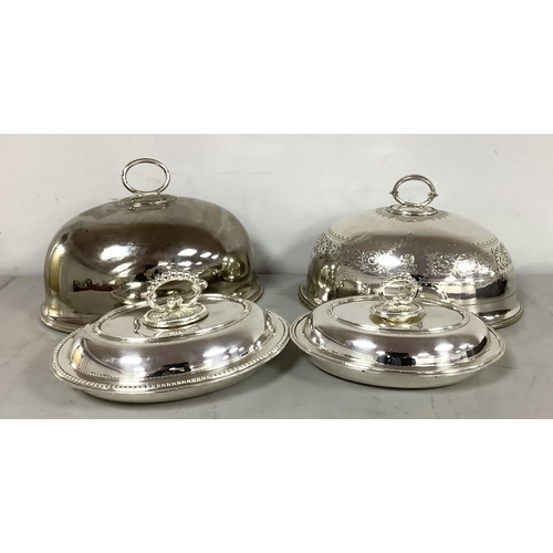 29 - An Oval Plated Meat Dome, with leaf scroll engraved decoration and beaded loop handle, crested, appr... 