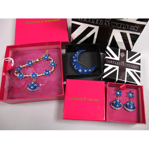 99 - Butler & Wilson; A Modern Stars and Planet Crystal Bracelet, in original box; Together with Butler &... 