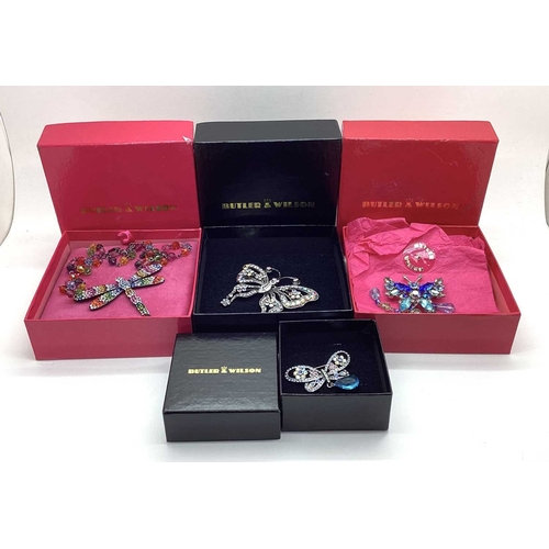 17 - Butler & Wilson; Moder Butterfly Brooches, boxed; Together with A Butler & Wilson Dragonfly Crystal ... 