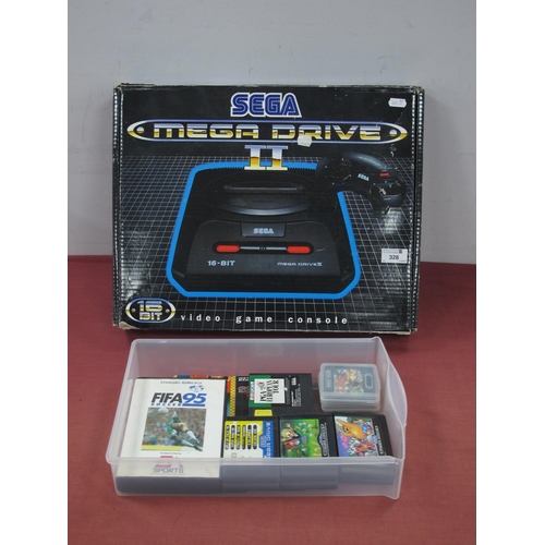 328 - A Boxed Sega Megadrive II 16-Bit Games Console, (ink/pen to power button), two controllers, literatu... 