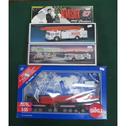 349 - Four Diecast and Plastic Model Vehicles to Include; Siku 1:55 #4311, Siku Mega Lifter, Hess Toy Fire... 