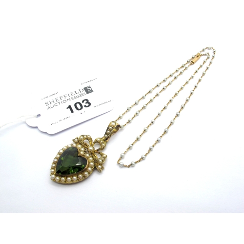 103 - An Edwardian Heart Shape Green Tourmaline and Pearl Set Pendant, collet set within pearl set border,... 