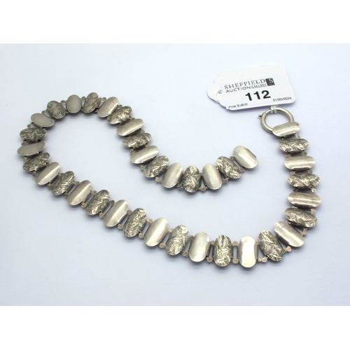112 - A Victorian Locket Collar, (lacking locket) composed of oval panel links, part engraved, to oversize... 