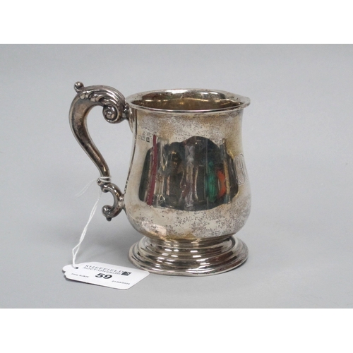 59 - A Hallmarked Silver Mug, WN Ltd, Birmingham 1925, of plain baluster form, initialled, with leaf capp... 