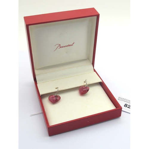 82 - Baccarat; A Pair of Modern Pink Crystal Heart Earrings, on hook fittings signed and stamped 