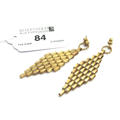 84 - A Pair of 9ct Gold Articulated Drop Earrings, of geometric design.