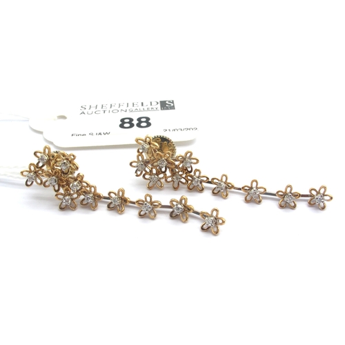 88 - A Pair of Modern 18ct White and Rose Gold Diamond Set Flowerhead Drop Earrings, of designer style, w... 