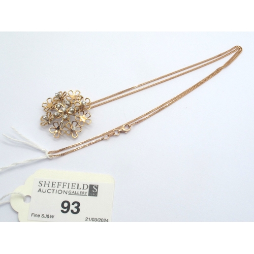 93 - A Modern 18ct White and Rose Gold Diamond Set Flowerhead Pendant, of designer style, with articulate... 