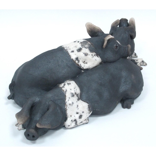 1061 - Lawson C. Rudge (b.1936) *ARR; A Raku Pottery Model of Three Piglets, signed, 43cm long, original re... 