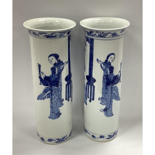 1148 - A Pair of Chinese Late XIX Century Sleeve Vases, painted in blue with ladies in interior settings am... 