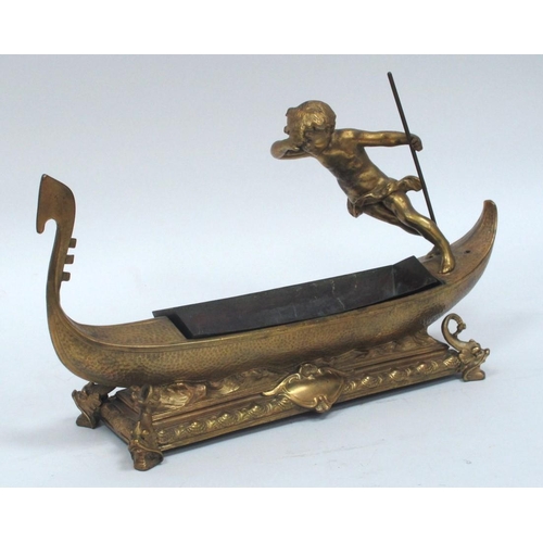 1276 - A Late XIX Century Gilt Metal Table Centrepiece, modelled as a cherub upon a gondola, the footed rec... 