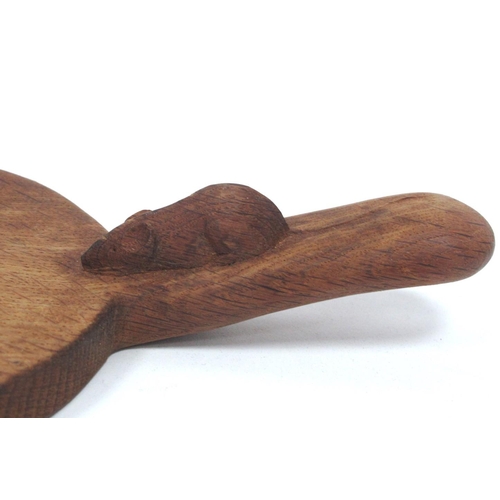 1289 - A Robert Thompson 'Mouseman' Oak Cheese Board, with short handle carved with mouse trademark, 37cm l... 