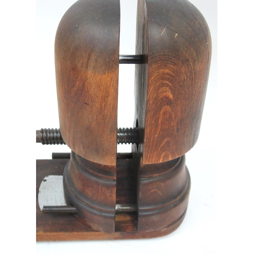 1298 - A Late XIX Century Wooden Hat Stretcher, with metal turning handle and measurement plate, 33cm high.