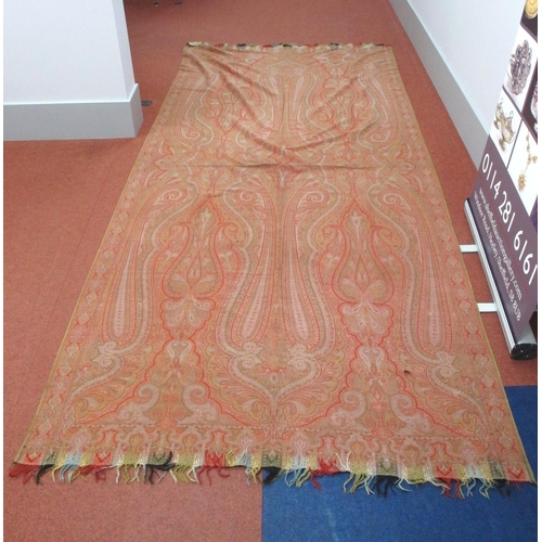 1372 - A Late XIX Century Paisley Wool Shawl, worked in shades of red, blue, green and beige with multi-col... 