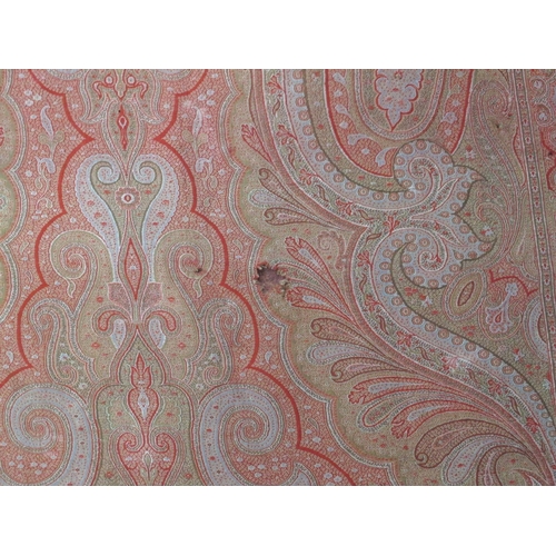 1372 - A Late XIX Century Paisley Wool Shawl, worked in shades of red, blue, green and beige with multi-col... 