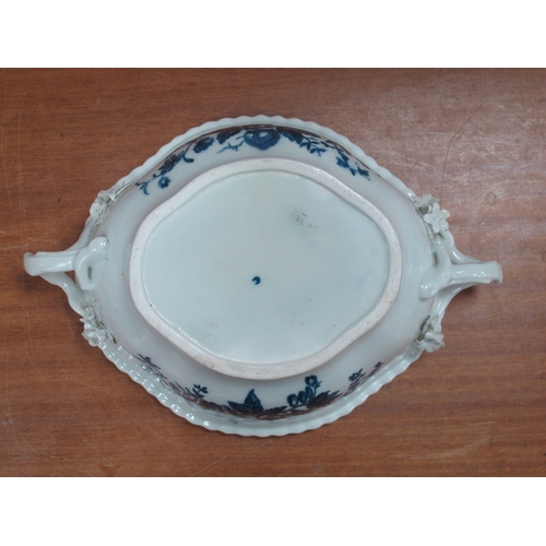 1052 - A Caughley Porcelain Tureen, Cover and Stand, of lobed oval form and applied twig loop handles, pain... 