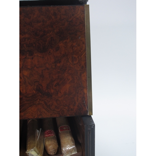 1283 - A Burr Elm Late XIX Century Cigar Cabinet, with hinged lid and front, enclosing a drawer and four tr... 