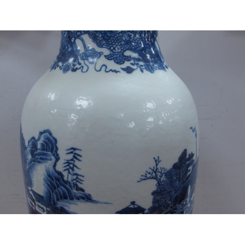 1154 - A Chinese XIX Century Porcelain Vase, of extended ovoid form, painted in blue with figures in a rive... 