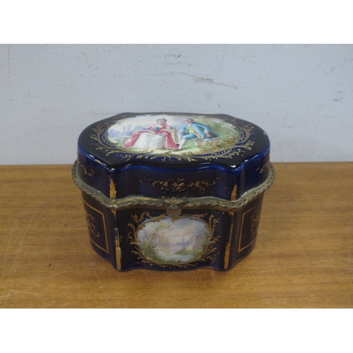 1064 - A Sévres Style Early XX Century Porcelain Trinket Box, of quatre lobed form, the cover with gilt met... 