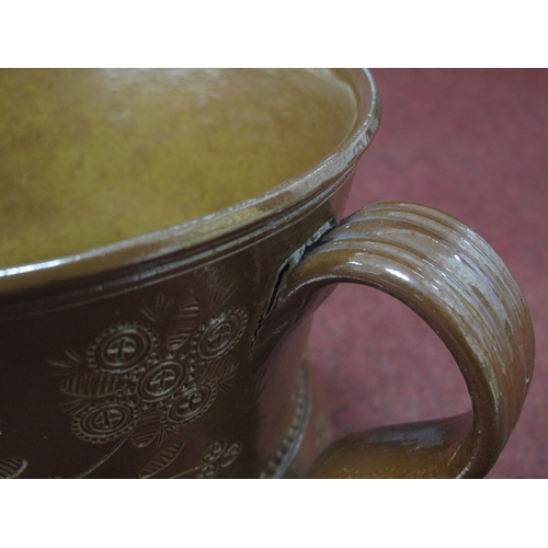 1084 - An Early XIX Century Salt-Glazed Stoneware Two-Handled Loving Cup, incised with floral decoration an... 