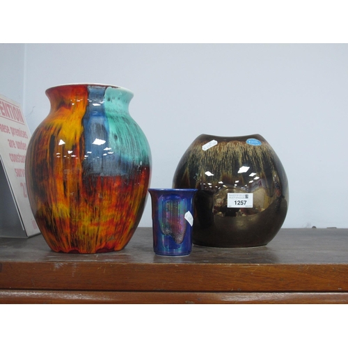 1257 - Poole Pottery - 'Precious' Small Purse Vase, 18cm high. Ovoid vase in traditional flame colours 24cm... 