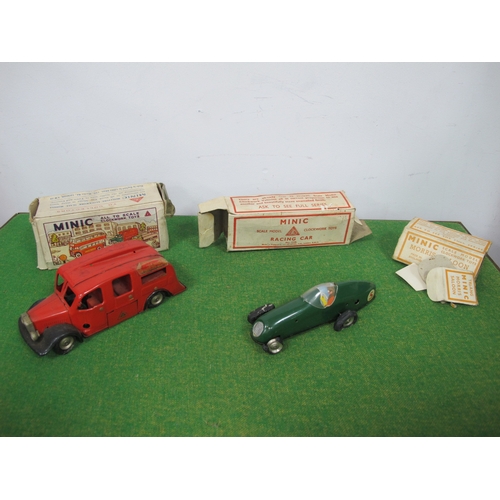 454 - A Quantity of Post Minic Clockwork Vehicles, including a plastic Royal Mail Van, boxed, a Fire Engin... 