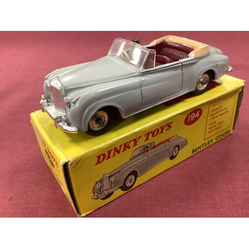 651 - Dinky Toys No 194 Bentley Coupe, overall very good, slight mark to one rear wing, screen unbroken, b... 