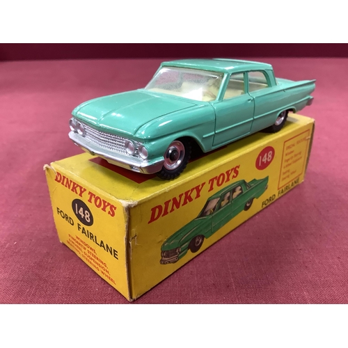 653 - Dinky Toys No 148 Ford Fairlane, light green, overall appears excellent, boxed, slight rubbing/stain... 