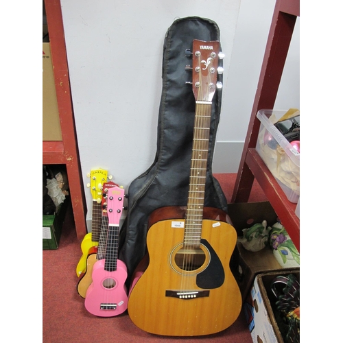 1050 - Yamaho F-310 Acoustic Guitar, Jay Turser JTA-67N/GS acoustic guitar, one with soft case. Mad about U... 