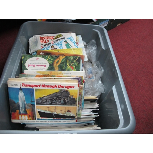 1082 - A Quantity of Cigarette Cards and Trade Cards, both loose and in albums.