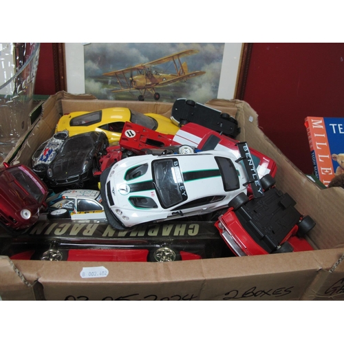 1016 - A large collection of metal and plastic model cars of varied scale largest 1/14 from Maisto, Hasbro,... 