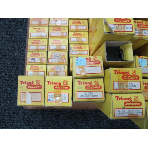 26 - Original Tri-ang TT rolling stock and coaches, boxed, approx. 50