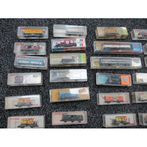 196 - Approximately Thirty 'N' Gauge Outline Continental Rolling Stock Items by Fleischmann, Minitrix, Roc... 