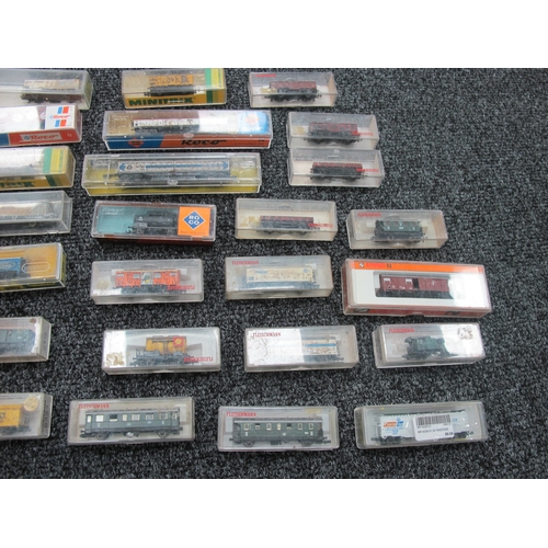 196 - Approximately Thirty 'N' Gauge Outline Continental Rolling Stock Items by Fleischmann, Minitrix, Roc... 