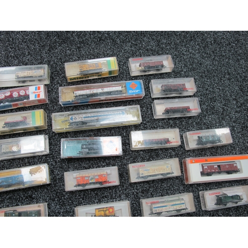 196 - Approximately Thirty 'N' Gauge Outline Continental Rolling Stock Items by Fleischmann, Minitrix, Roc... 